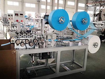 Loading and unloading robot bin in one machine